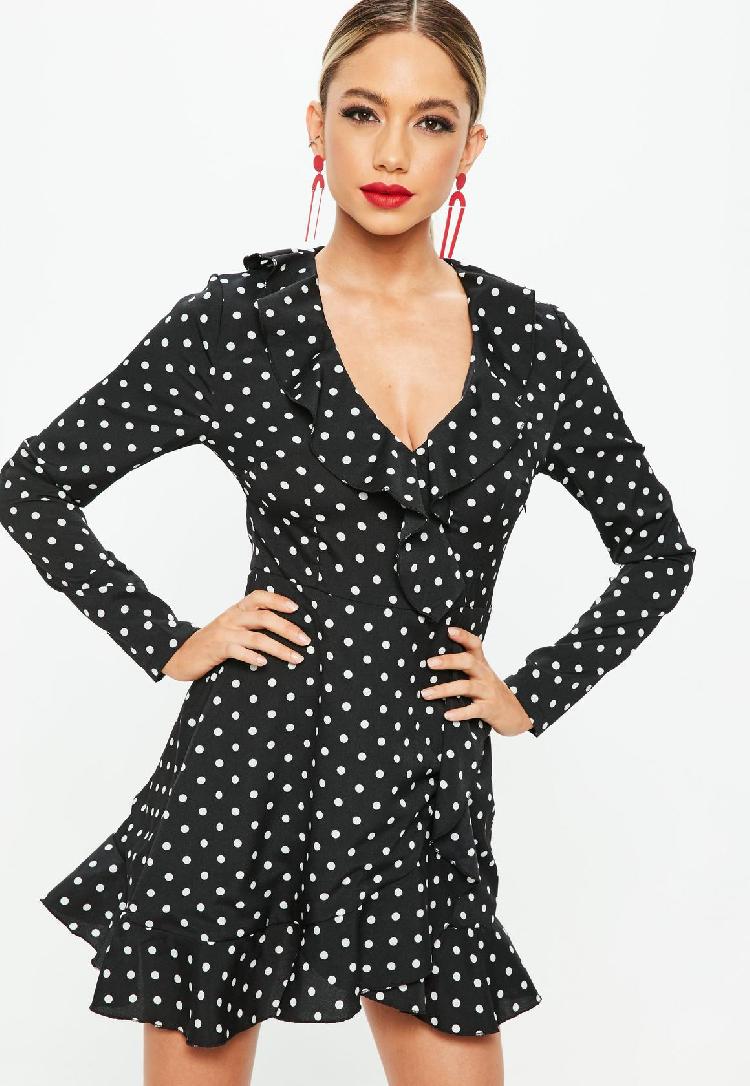 Black polka dot ruffle tea dress front body